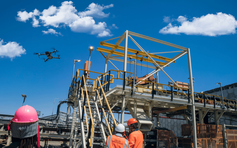 Drone inspecting building process of a construction